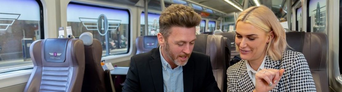 Relaxed Professionals in train with confidence gained from claustrophobia hypnotherapy